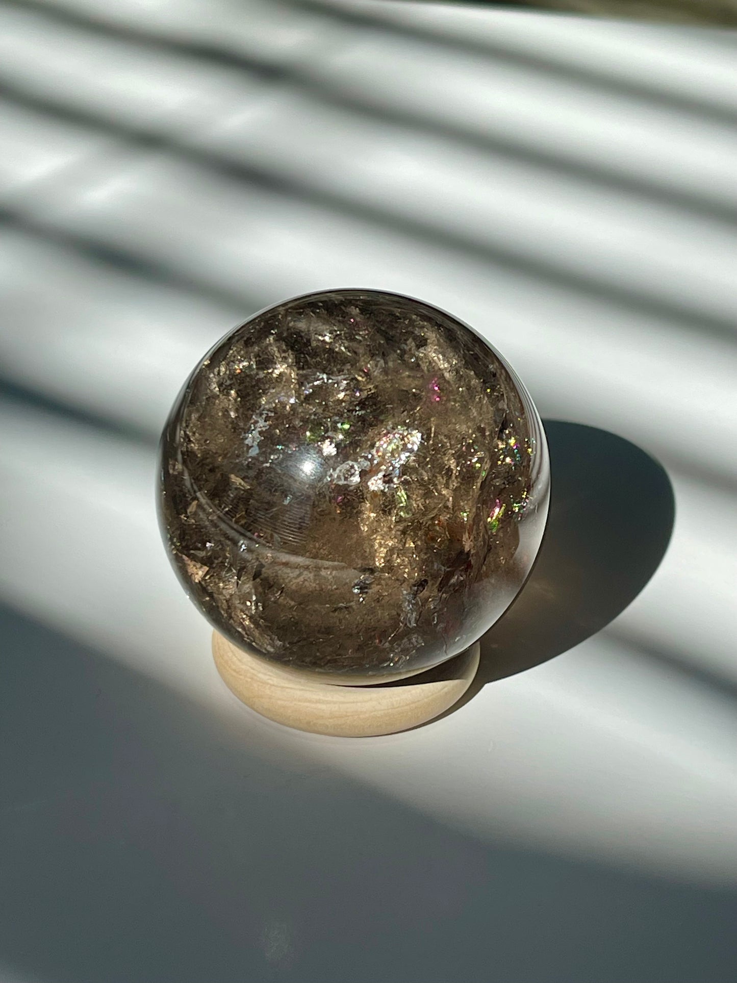 Rainbow Filled Smokey Quartz Sphere