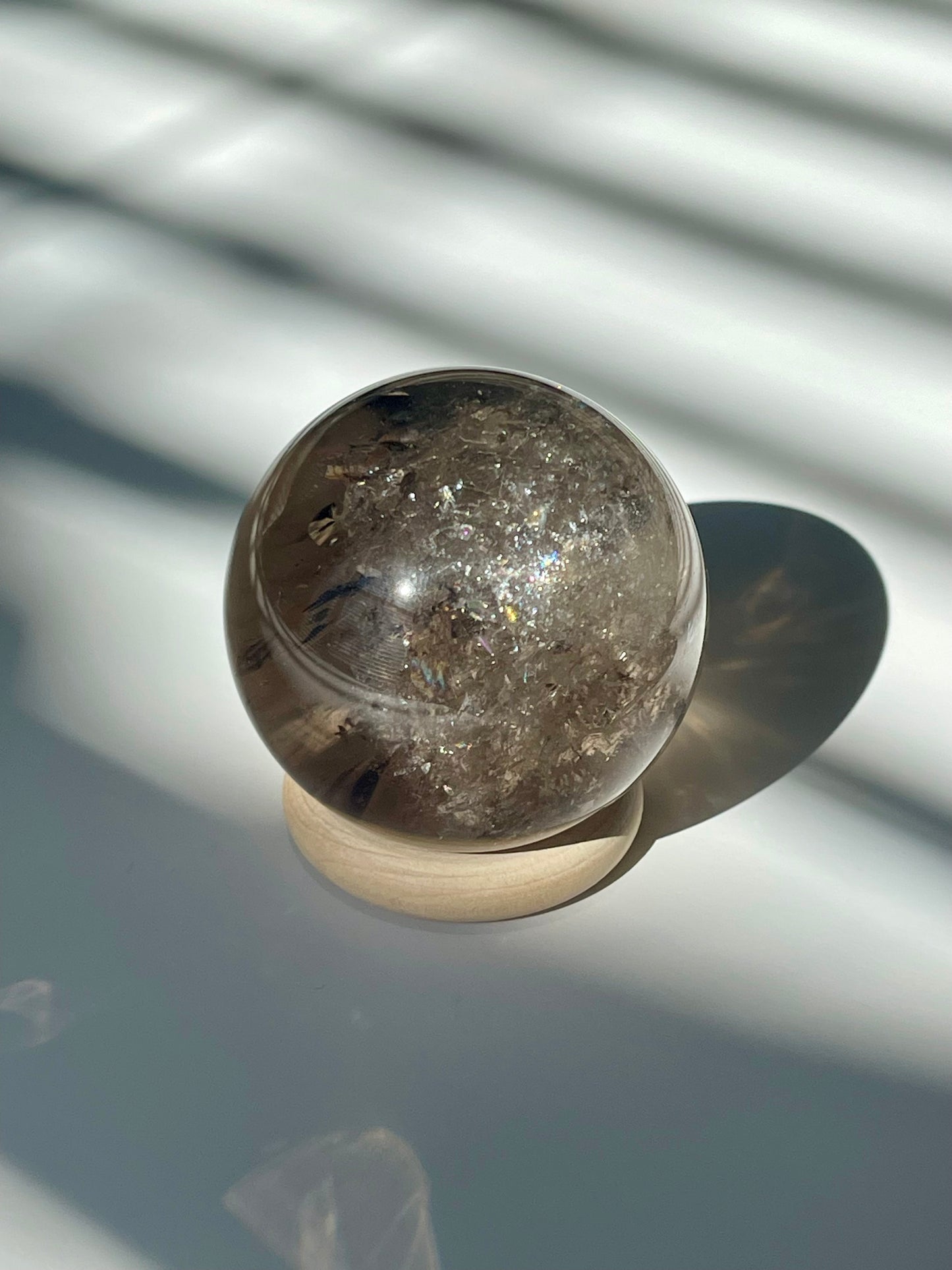 Rainbow Filled Smokey Quartz Sphere