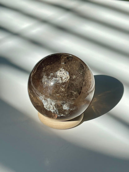 Rainbow Filled Smokey Quartz Sphere